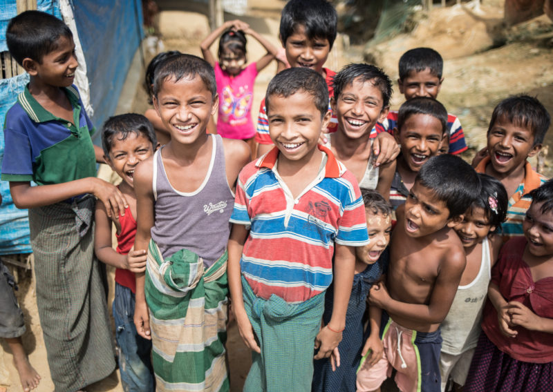 Harun, a Rohingya Refugee in the Kutupalong Refugee Camp, smiling with his friends