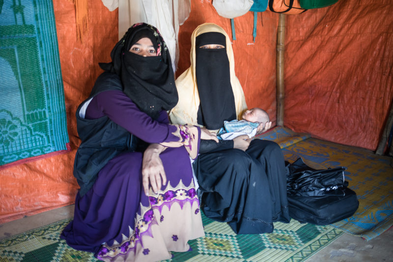 Community Health Worker Taslima, visiting a new mother in the Rutupalong Refugee Camp in Bangladesh