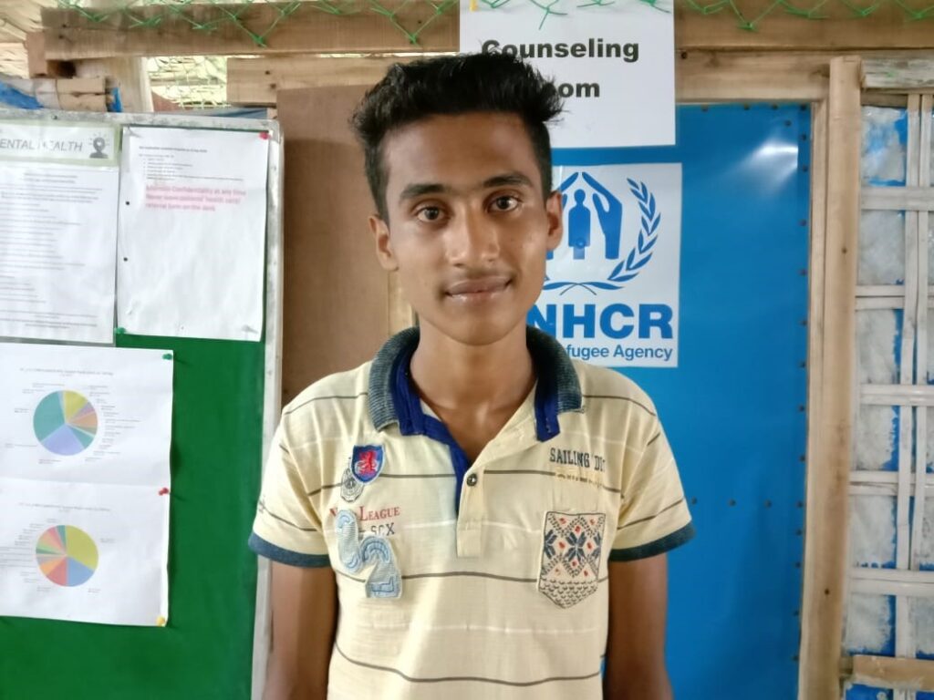 Hepzoor smiling at one of his final group counseling sessions in Bangladesh.