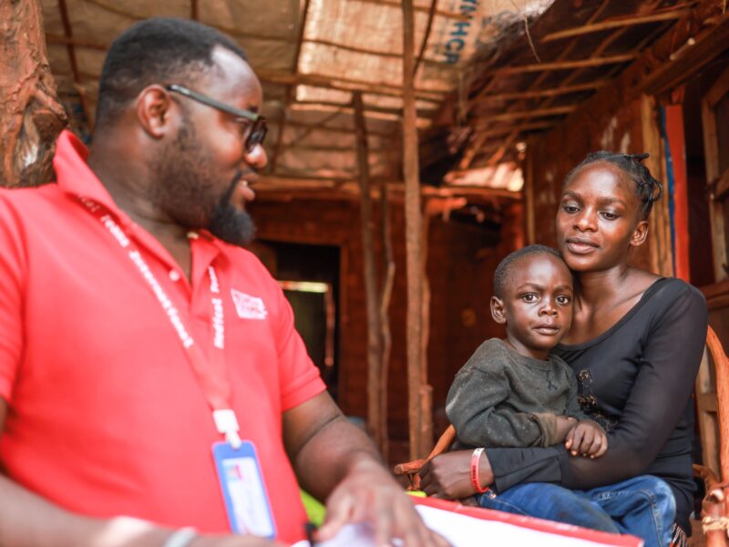 Niyukuri and Nibizi with a health care worker in Tanzania